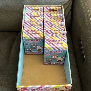 7 NWT Series 3 Hello Kitty Plush Danglers. None opened